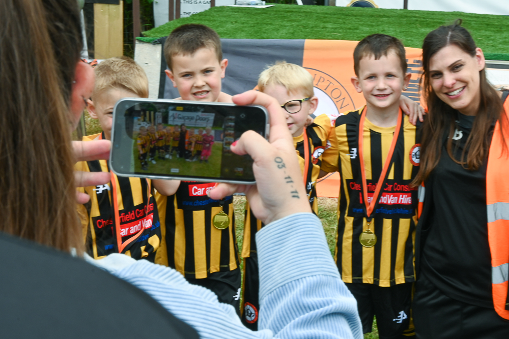 Photo of players with their tournament medals