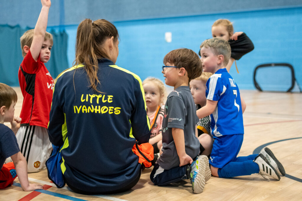 Children playing football at a Little Ivanhoes Football Session.